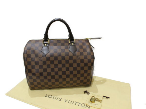 imgrc0078542902 Louis Vuitton Speedy 30 Damier Ebene Handbag Brown