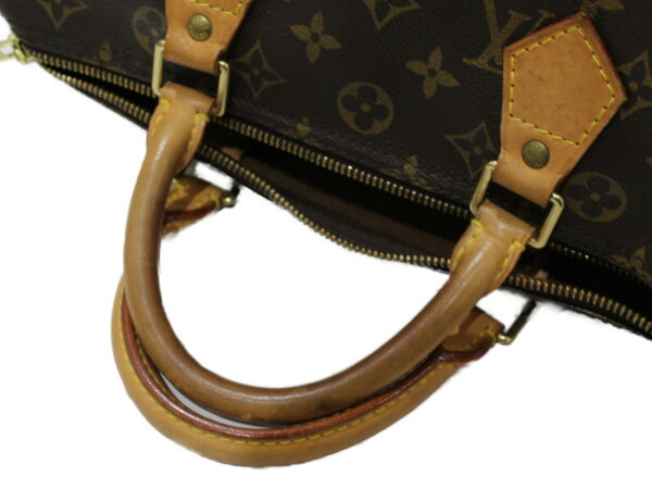 imgrc0078970876 Louis Vuitton Speedy 30 Monogram Handbag Brown