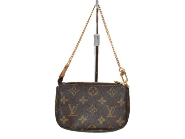 imgrc0079111497 Louis Vuitton Mini Pochette Accessory Handbag Monogram Brown