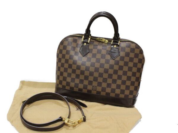 imgrc0079293267 Louis Vuitton Alma Damier Ebene 2WAY Bag Brown