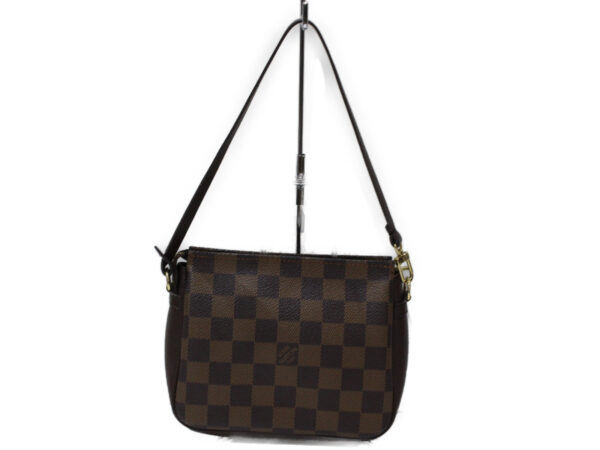 imgrc0079293730 Louis Vuitton Truth Pouch Damier Ebene Brown