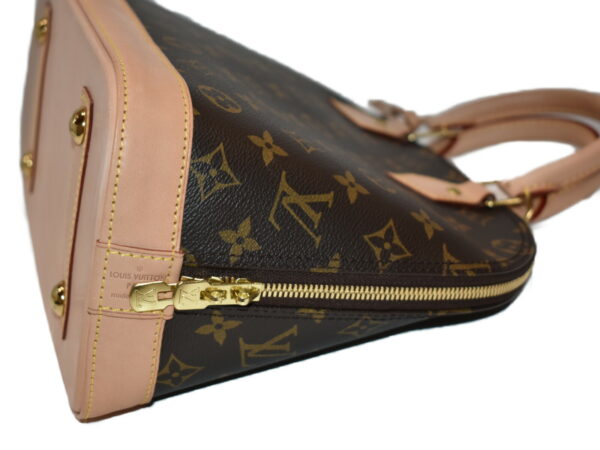 imgrc0079395952 Louis Vuitton Alma Monogram Canvas Handbag Brown