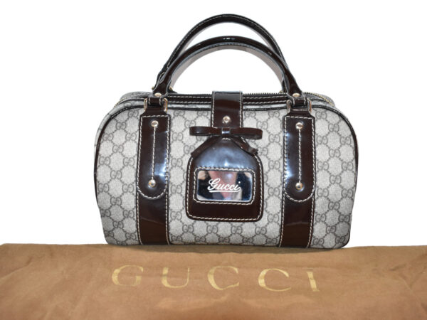 imgrc0079648789 Gucci GG Supreme Mini Bag Brown