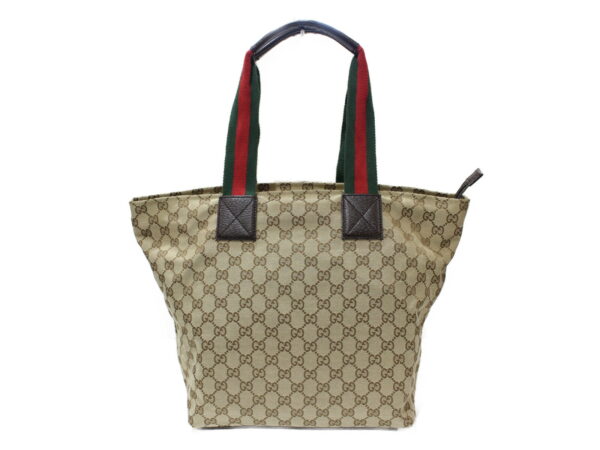 imgrc0079693244 Gucci Canvas Leather Tote Bag Beige Brown