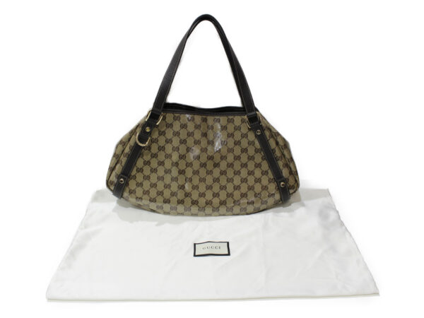 imgrc0079695911 Gucci GG Canvas Nylon Bag Beige Brown