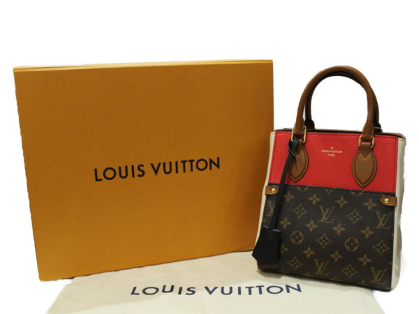 imgrc0081618799 Louis Vuitton Fold Tote PM Leather Handbag Crème Noir Red