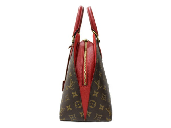 imgrc0083264730 Louis Vuitton Alma Bag Into Bag Monogram Handbag Red