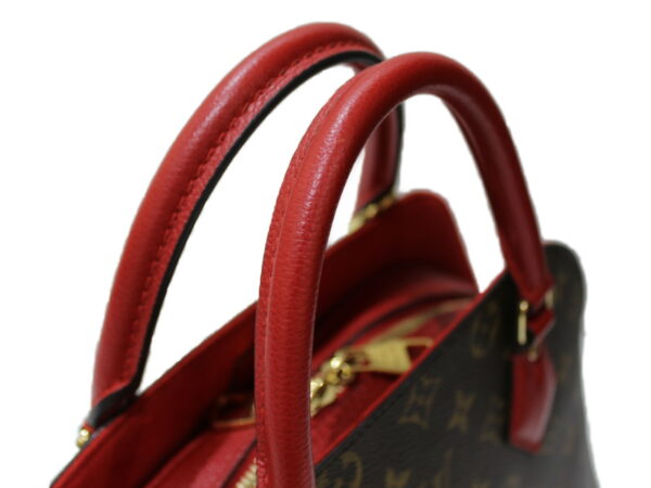 imgrc0083264741 Louis Vuitton Alma Bag Into Bag Monogram Handbag Red