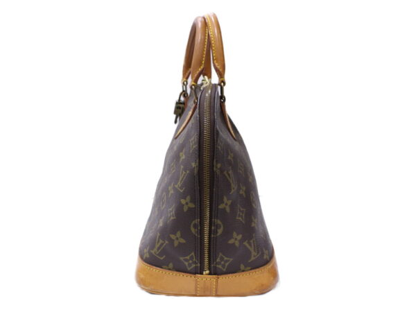 imgrc0086595840 Louis Vuitton Alma Monogram Canvas Handbag Brown