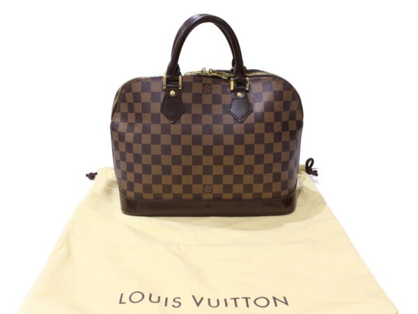 imgrc0086727247 Louis Vuitton Alma Damier Canvas Handbag Brown