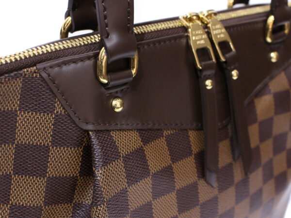 imgrc0086984371 Louis Vuitton Westminster PM Damier Canvas Handbag Brown