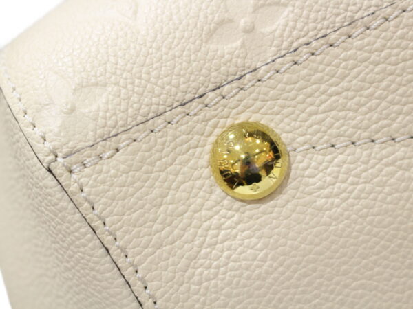 imgrc0087707998 Louis Vuitton Montaigne MM Empreinte Leather Cream White