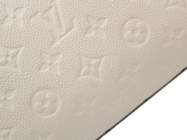 imgrc0087708008 Louis Vuitton Montaigne MM Empreinte Leather Cream White