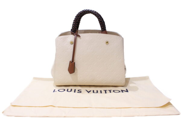 imgrc0087708011 Louis Vuitton Montaigne MM Empreinte Leather Cream White