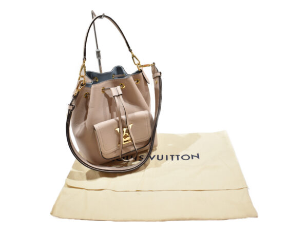 imgrc0091802195 Louis Vuitton Lock Me Bucket Drawstring Bag Greige Grain Calf