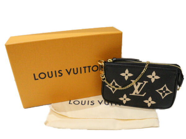 imgrc0093032433 Louis Vuitton Mini Pochette Accessoire Monogram Empreinte Pouch Black Beige