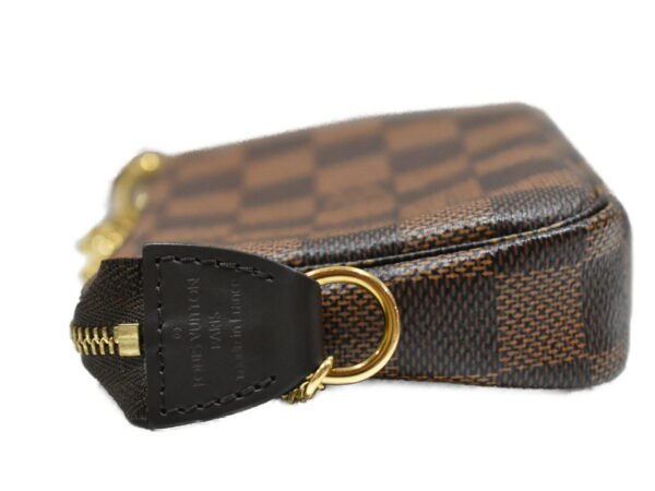 imgrc0098008994 Louis Vuitton Mini Pochette Accessoire Mini Bag Damier Ebene Brown