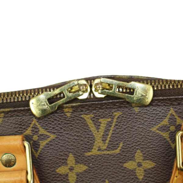 imgrc0099226044 Louis Vuitton Alma Monogram Canvas Handbag Brown