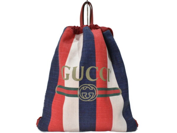 imgrc0100117708 Gucci Drawstring Backpack Canvas Striped Blue Red White