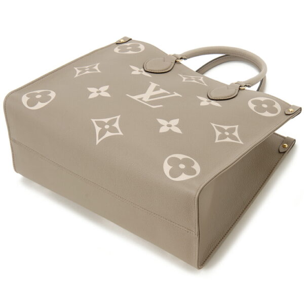 lv45494 1 Louis Vuitton On the Go MM Empreinte Tote Bag Beige