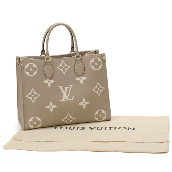 lv45494 3 Louis Vuitton On the Go MM Empreinte Tote Bag Beige