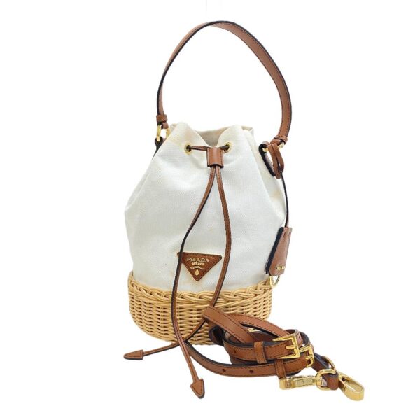 z0005118 1 Prada Wicker Bucket Drawstring Handbag White