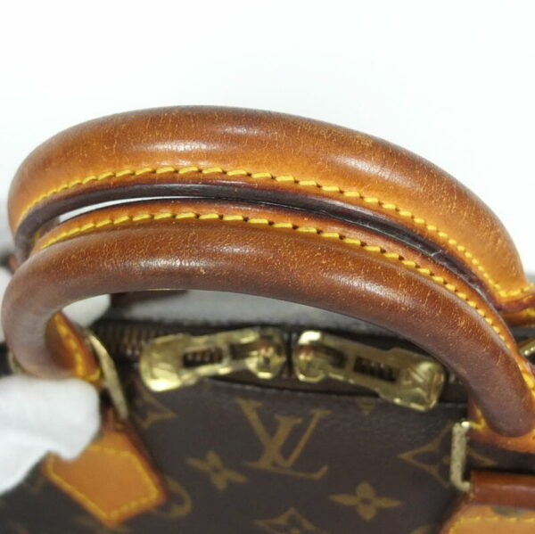 10003487 5 Louis Vuitton Alma Monogram Handbag