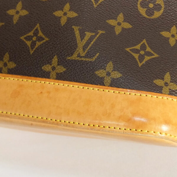 10003580 5 Louis Vuitton Alma Monogram Handbag