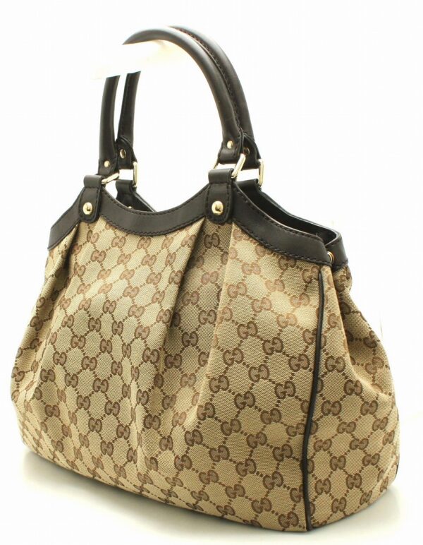 11671053 1 Gucci GG Canvas Sookie Handbag Beige