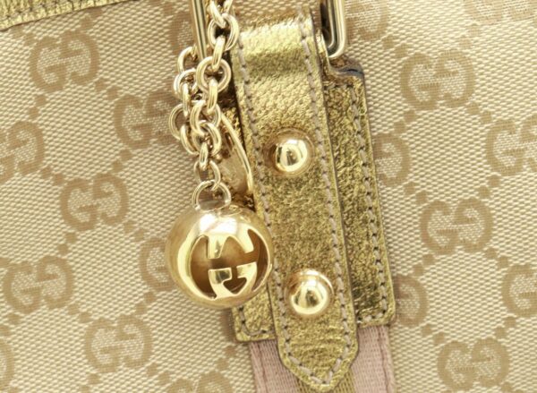 11830256 7 Gucci GG Tote Bag Metallic Leather Khaki Beige with Charm