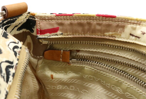 12040569 5 Prada All Over Nylon Handbag Camel Beige