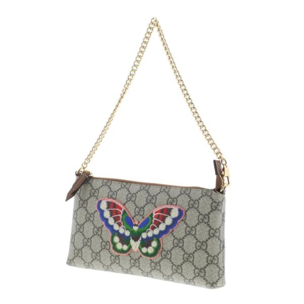 1240002020232 2 Gucci Holiday Collection GG Supreme Butterfly Pouch Beige