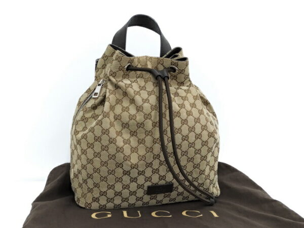 2000087252000645 10 Gucci Rucksack Logo GG Beige