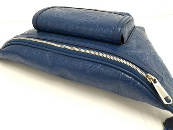 2000087252000670 7 Gucci Body Bag GG Embossed Leather Blue