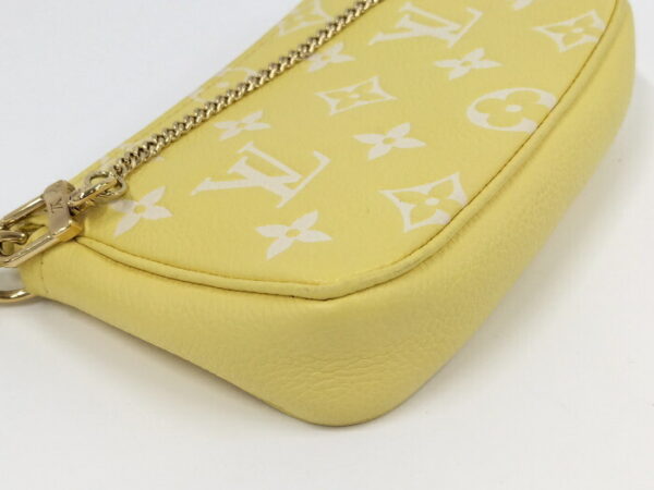 2000803252000694 3 Louis Vuitton Pochette Accessoire Mini Pouch Empreinte Yellow