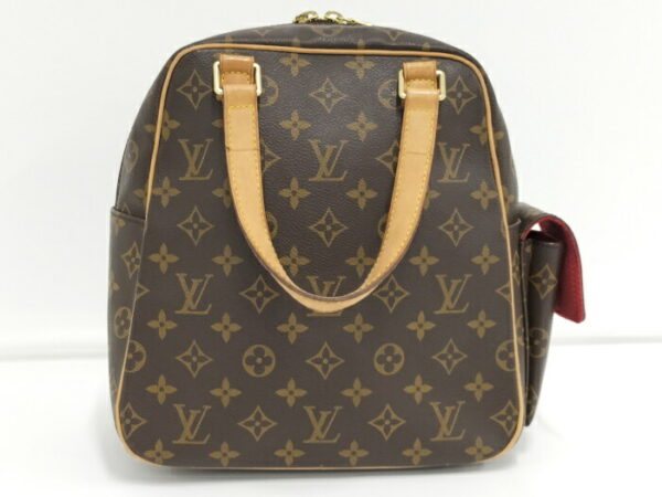 2000803252000732 2 Louis Vuitton Exantori Cité Handbag Monogram