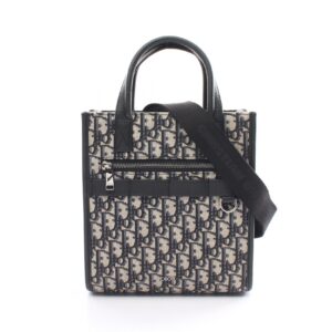 2107601004159 1 Louis Vuitton On The Go PM Monogram Reverse Handbag