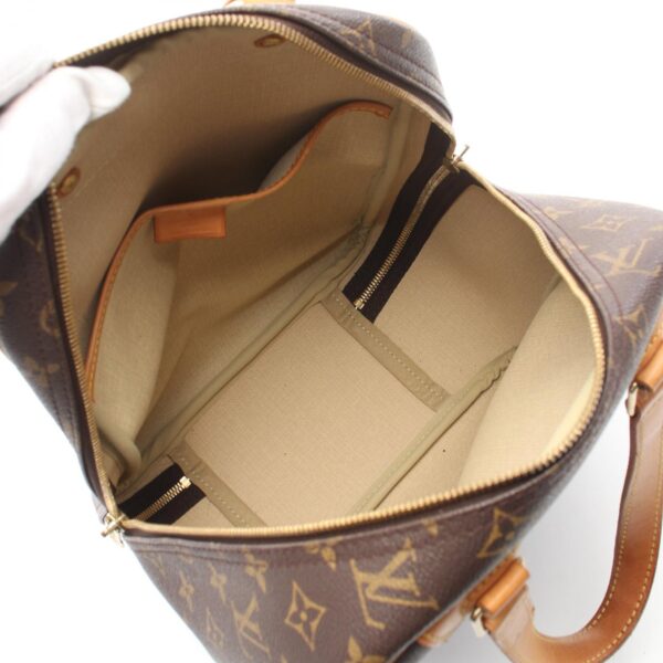 2118700061974 3 Louis Vuitton Excursion Handbag Leather Monogram Brown