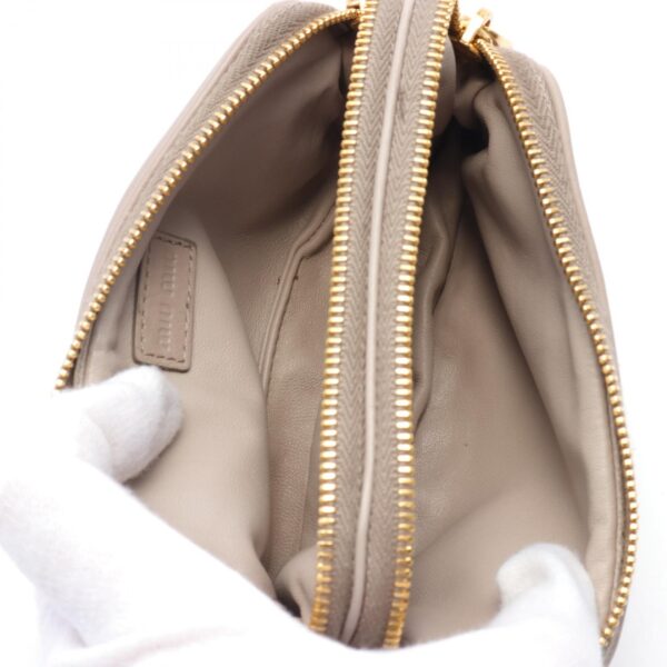 2118800104120 3 Miu Miu Pouch Bag Leather Beige