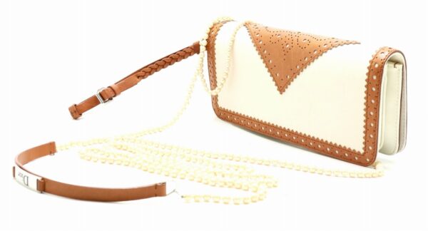 31821273 1 Christian Dior Perforated Leather Clutch Bag Pearl Camel