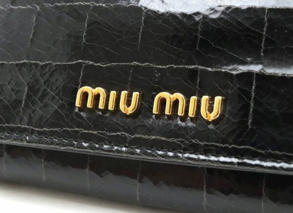 31851521 7 Miu Miu 6 Row Key Case Embossed Leather Black