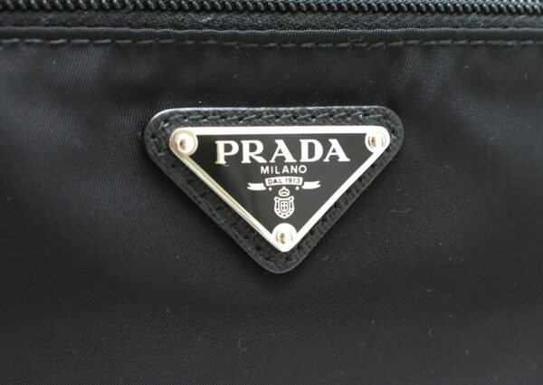 31870844 6 Prada Clutch Bag Nylon Leather Black