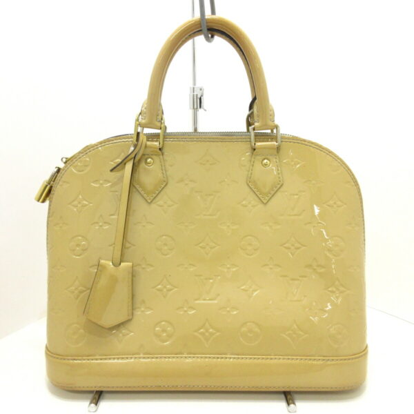 37396593 1 Louis Vuitton Alma PM Handbag Patent Leather Dune