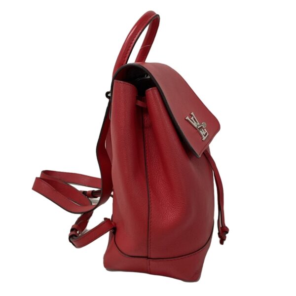 37397191 2 Louis Vuitton Lock Me Backpack Rucksack Ruby Leather