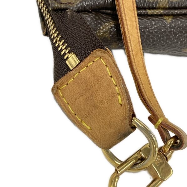 37626736 11 Louis Vuitton Pochette Accessoire Handbag Monogram Canvas