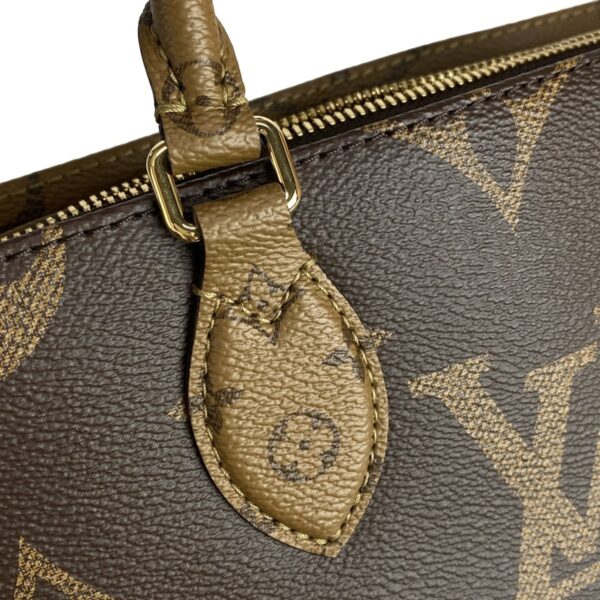 37983078 16 Louis Vuitton On the Go EW Handbag Monogram Reverse Canvas