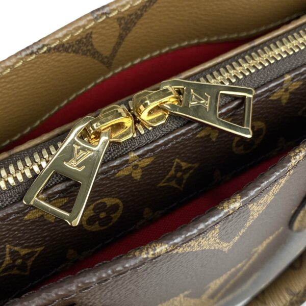 37983078 17 Louis Vuitton On the Go EW Handbag Monogram Reverse Canvas