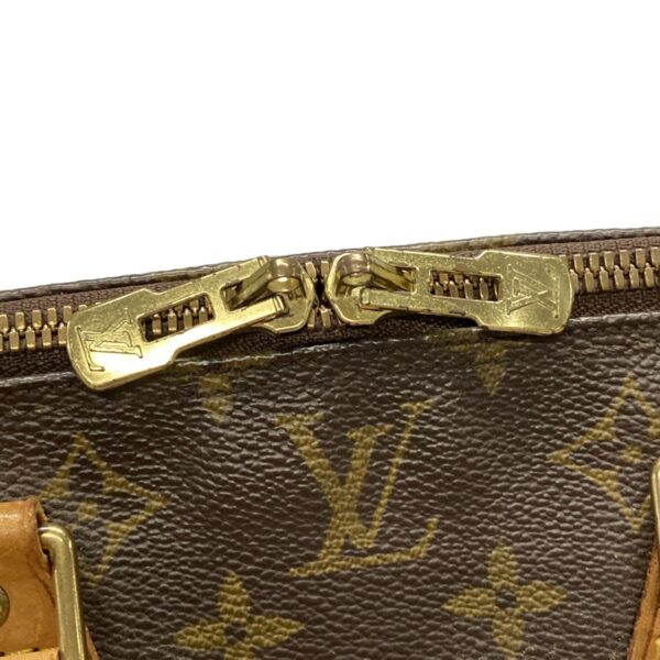 37995091 17 Louis Vuitton Alma Handbag