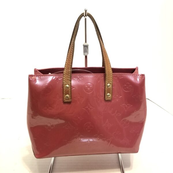 37999912 3 Louis Vuitton Lead PM Handbag Leather Framboise