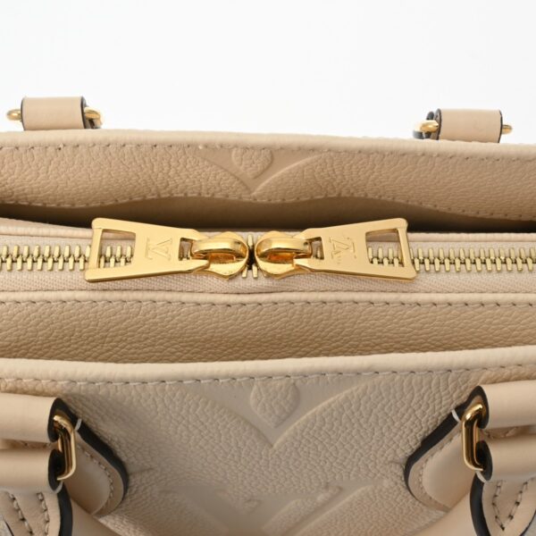 800000128316000 10 Louis Vuitton On the Go EW Leather Handbag Empreinte Claim